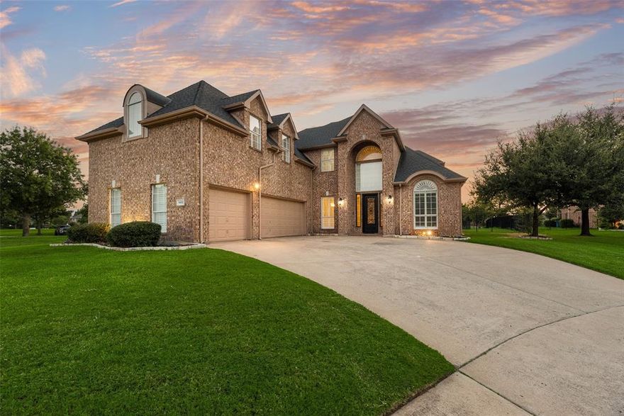 Experience luxury living in Waterview, one of the most desirable golf course communities in Rowlett, Texas, located in Rockwall ISD with easy access to I-30, Lake Ray Hubbard, Downtown Rowlett, Rockwall, and Dallas. This beautifully updated 3,986 sq. ft. corner-lot home overlooks the Waterview Golf Course and offers an exceptional blend of elegance, comfort, and resort-style living.

Inside, enjoy hardwood floors, crown molding, and plantation shutters throughout. The formal dining room is ideal for entertaining, while the open-concept kitchen features granite countertops, a large walk-in pantry, LED lighting, updated appliances, and a breakfast bar that opens seamlessly to the spacious living area.

The private backyard oasis includes a sparkling swimming pool, built-in spa, and unobstructed golf course views—perfect for relaxing or hosting guests. This home is within walking distance to the Waterview clubhouse, offering access to championship golf, a waterpark, tennis courts, scenic walking and biking trails, playgrounds, and stocked fishing ponds.

The primary suite is a peaceful retreat with a spa-inspired bathroom and oversized walk-in closet. Upstairs, a large game room and an expansive media room with projector provide flexible living and entertainment space.

Recent upgrades include refinished hardwood floors, new kitchen appliances, HVAC systems under three years old, new pool plaster, and upgraded 60-oz carpet upstairs.

Located minutes from shopping, dining, George Bush Turnpike, and major employment centers, this home offers outstanding value in a premier Rowlett golf course neighborhood. Schedule your private showing today.