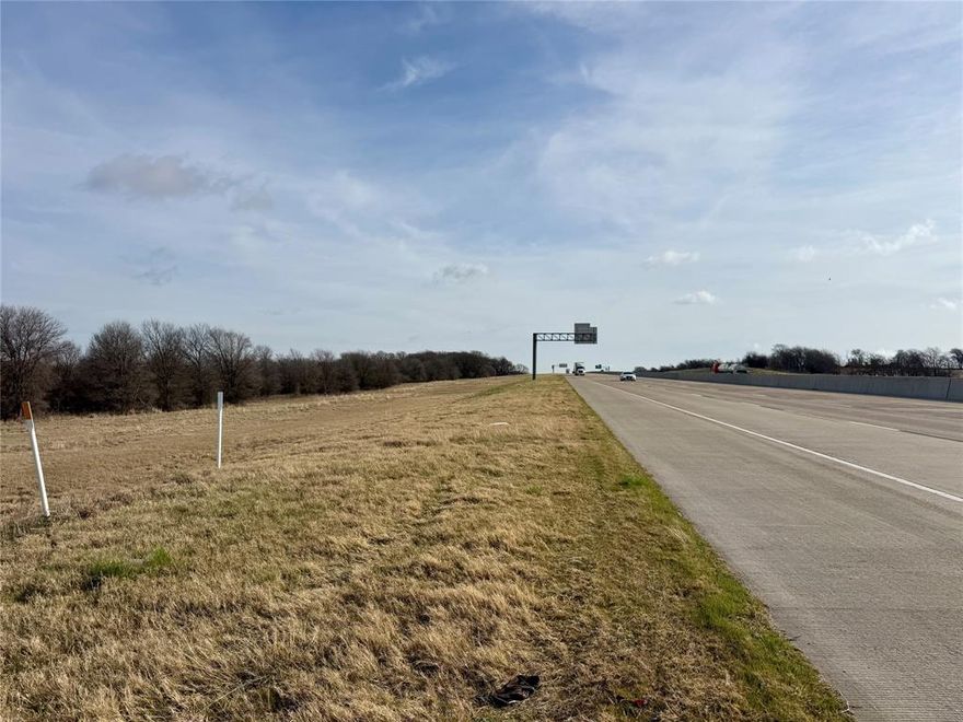 Small 3.816 tract of land.  Perfect for some bill boards.  High traffic area on I-35 E.  There is no access to this property.  TXDOT does not have a service road on this portion of I-35.  The old Hill County road that used to be the access road to this property has been abandoned in the '70's, we think.  No record of this.  No utilities so if someone were considering bill boards it would have to be solar powered.  Property is at the mile marker sign 372 on I-35 E.