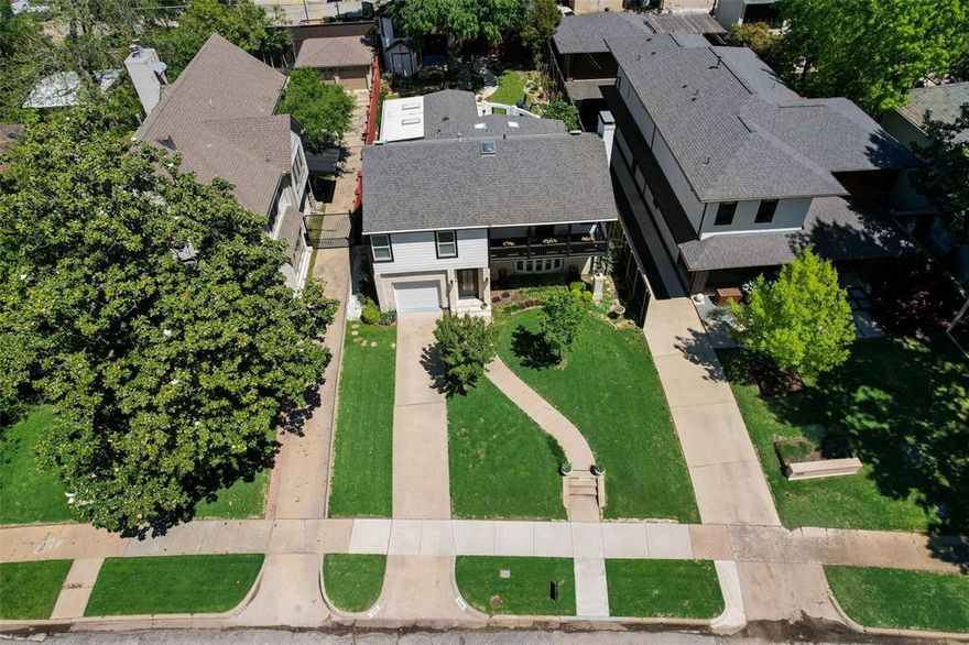 One of the best values in Perry Heights, priced for today’s market and offering buyers the opportunity to modernize and customize their new home, on one of the neighborhood’s most desirable streets, Rawlins Street. Surrounded by multimillion dollar estates and lush, tree lined views, this home perfectly captures the timeless character and small-town feel that makes Oak Lawn one of Dallas’ most sought after central destinations.

The interior is thoughtfully designed for both grand entertaining and comfortable daily living. A spacious chef’s kitchen serves as the heart of the home, flowing seamlessly into a bright living area anchored by a cozy fireplace and an expansive formal dining room. The main level prioritizes versatility with a private guest bedroom featuring an ensuite bath, perfect for a mother-in-law suite, and a separate sunroom that serves as an ideal home office, art studio, or gym. Upstairs, the layout continues to impress with a generous flex space that can function as a secondary primary suite or media room, opening onto a large, covered private balcony.

Design & Customization: To help you truly make this home your own, the owner will consider a paint concession, allowing you to bring your unique vision to this historic canvas.

The outdoor oasis is a rare find for the area, boasting a large patio, a private pool with a water feature, and a grassy yard secured by wood privacy fencing. While the home includes an attached garage large enough for an SUV, there is also the flexible option to add a rear entry garage via the alley. Enjoy an unbeatable walk score with Craddock Park at the end of the street and neighborhood favorites like Whole Foods, Bob’s Steak & Chop House, and Gloria’s just steps away. With easy access to the Medical District and Downtown, this is the ultimate Dallas address.