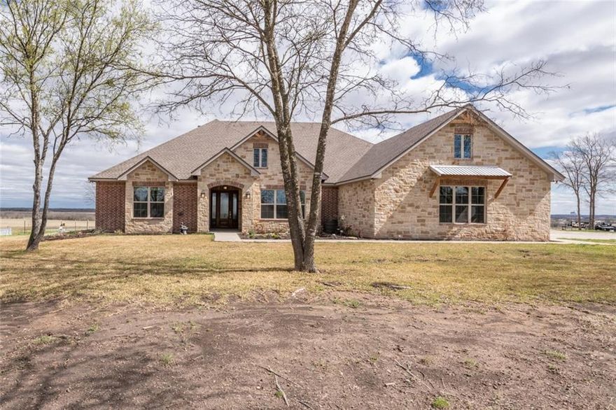 Come enjoy a slice of the country on a beautiful paved road just minutes to town in Robinson ISD! You will love the GORGEOUS home, MASSIVE workshop, TRANQUIL pond and the many many features this property has to offer inside and out.  The interior features 4 spacious bedrooms, 3 full bathrooms, a wonderful open-concept floor plan, a walk-in pantry, mud nook, and a decked out laundry room! On the exterior you will LOVE coming home to VIEWS in every direction, a HUGE covered back patio to enjoy the water and livestock view, and a versatile workshop that flexes as a covered storage port and barn.  The property is currently under an Ag Exemption as of 2022!