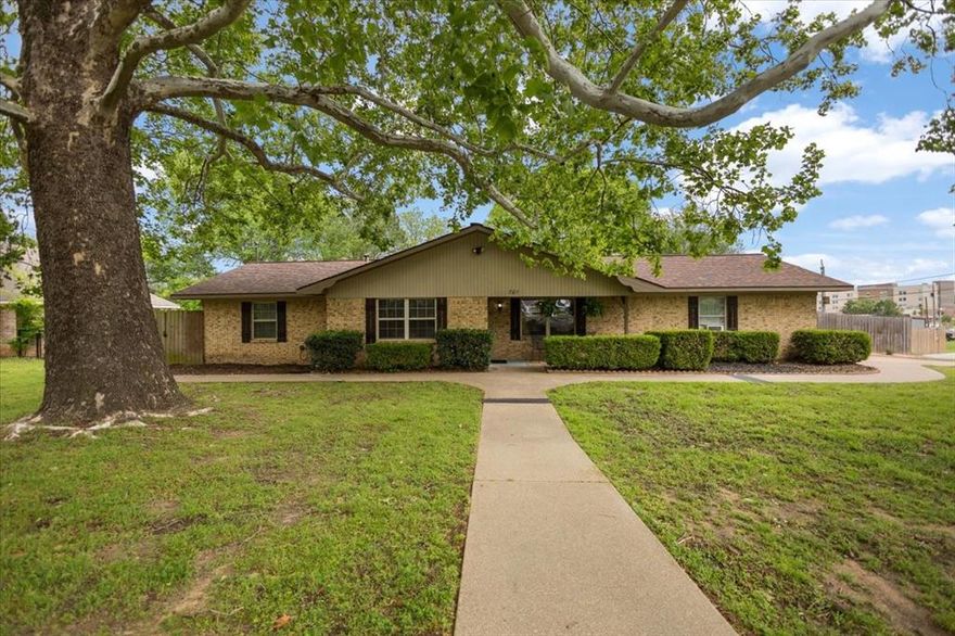 Updated 4 bedroom, 3 bath home on a rare oversized corner lot with two primary suites and a large workshop or storage building with approximately 250 sq. ft. of bonus space above. This beautifully maintained home situated on a half-acre corner lot in a quiet, established neighborhood is perfect for multi-generational living or hosting guests in comfort. The heart of the home is a spacious kitchen equipped with abundant storage, a walk-in pantry, and a versatile movable island, making it ideal for both everyday living and entertaining. Adjacent to the kitchen, you’ll find a large dining area that easily accommodates gatherings of all sizes. Durable laminate and tile flooring run throughout the home for easy maintenance and a clean, updated look. Step outside to relax on the screened-in back porch or the covered front porch, both are perfect spots to enjoy peaceful mornings or unwind in the evenings. The three and a half year old roof features Stage 3 shingles for durability, along with ridgeline ventilation and 13 inches of attic insulation offering energy efficiency. Conveniently located close to downtown Lindale, popular local dining, and TJC North, this home combines comfort, functionality, and location in one exceptional package.