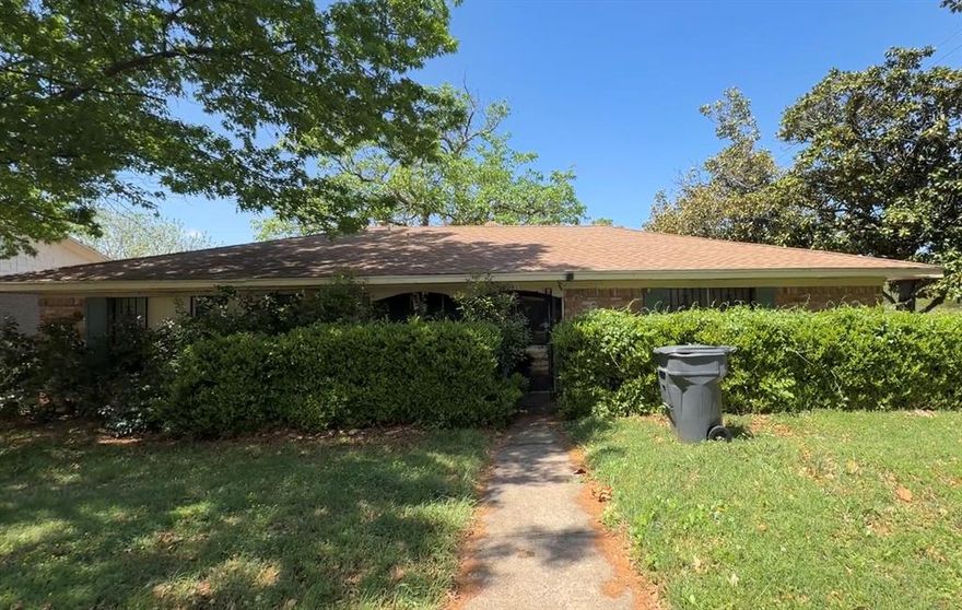 Prime East Dallas CORNER LOT with easy access to I-30 and Downtown Dallas. Investor special and perfect fixer upper with strong upside potential to renovate and add value. Functional layout features a living and dining combo, spacious den with fireplace and recirculating heat system, and a breakfast area that opens to the kitchen. Kitchen includes butcher block countertops, gas cooktop, and oven ready for your vision. Enjoy the covered patio, plus a garage with large storage closet and dedicated work area. Ideal for investors or buyers looking to customize and maximize value.