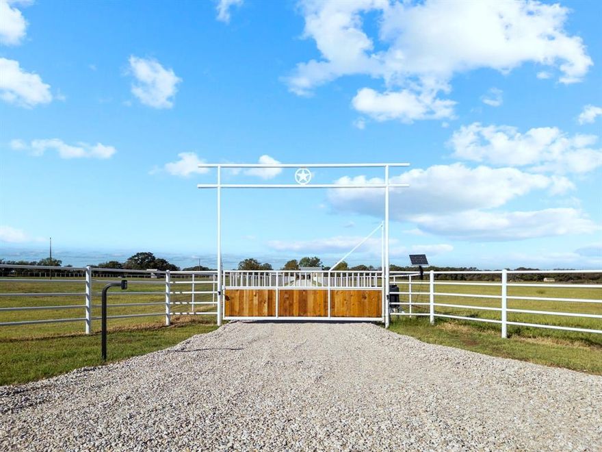 Welcome to 905 Ballew Springs Rd, the Texas Ranch you have been dreaming of. After entering the brand new custom entrance, complete with pipe fence and automatic gate, follow the lane to your beautiful custom home, situated on over 50 ag-exempt acres. This property is fenced and cross fenced with excellent horse property potential including a barn, loafing shed and sandy soils for excellent arena potential. The property also shares a fence with the Lake Mineral Wells State Park, boasts abundant wildlife, is conveniently located about a mile from the 20+ mile Trailway, boasts a great Coastal Bermuda hay field, a one-acre stocked pond, a 30x50 shop with concrete floors, three water wells and more! Enter the custom home, completely renovated in 2015, and enjoy an open concept floorplan with a touch of country living. The rock fireplace lures you into the warm living room setting, and the commercial Viking cooktop will impress any chef. The spacious primary suite has lots to offer, and the large front and back patios provide the perfect atmosphere for enjoying views of your ranch.  This home has been impeccably maintained, features two brand new, state of the art 22 seer HVAC systems, custom filtration, a standing seam metal roof and more! The quality is hard to beat! The 50+ acres provides just about everything you could ever want: an improved Coastal Bermuda hay field, plenty of pasture, 13 producing native pecan trees, lots of mowed and trimmed up trails, clearings and more! Need a second residence or are you considering a development? This property boasts multiple build sites, and THREE water wells, one over 1000 ft deep! Horse property, cattle ranch, hunting, fishing, or development... the possibilities are endless.  Don't miss your chance to make this property your own! All information in this listing is considered reliable but not guaranteed and should be verified by the buyer.