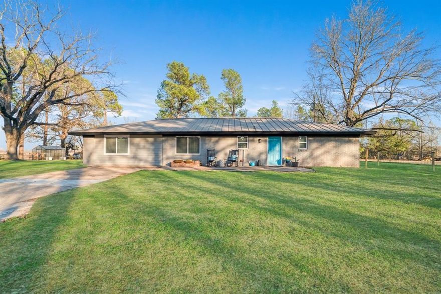 Welcome to 127 Farm Road 1499 in Paris, Texas — where modern updates meet peaceful country living on 3.23 beautiful acres. This fully renovated 3-bedroom, 3-bath home has been thoughtfully redesigned to create an open, inviting floor plan perfect for everyday living and entertaining. After entering through an automatic gate with pipe fencing that expands across the entire front of the property, step inside to find a spacious kitchen, dining, and living area featuring new wood-grain tile flooring that blends durability with warm, natural style. The expanded open concept creates a seamless flow between spaces. The living area opens to a spacious deck with cozy lighting to relax or entertain after a dip in the new 18ft pool. Pool has a Robotic Cleaner for ease of maintenance. 
A rare and desirable feature of this home is the presence of two primary bedrooms, each complete with its own private bathroom and closet — ideal for multi-generational living, guests, or added privacy. There is a dream pantry that is 5x15 complete with electricity perfect for a coffee bar or work space. 
Outside, the property truly shines. Enjoy 3.23 acres of room to roam with a greenhouse, new 24x20 shop, a smaller storage unit with additional attached space for a chicken coop , all with concrete floors. Ample space for gardening, hobbies, or small livestock., and a RV hook-up with 50-amp service make this property perfect for travelers, guests, or additional income potential.
If you’re looking for updated comfort, versatility, and country charm just minutes from town, this property offers the perfect blend of space and opportunity.