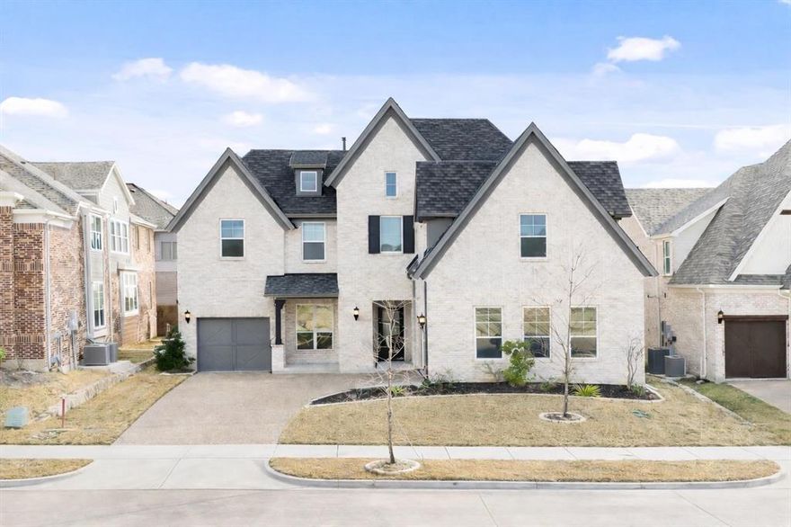 Discover luxury living in the highly sought after Monterra community in Fate, Texas with this stunning single family home located at 1227 Calabria Way. Built in 2023 and offering 3,716 square feet of thoughtfully designed living space, this two story residence features 5 spacious bedrooms, 4 full bathrooms, 3 living areas, 2 dining areas, and a dedicated media room, providing ample space for both everyday living and entertaining. The open concept kitchen is a true showpiece with built in cabinets, granite countertops, a large island, walk in pantry, and water line to the refrigerator, seamlessly flowing into the inviting living room with a gas fireplace and ceiling fans. The primary suite offers a private retreat with dual sinks, separate vanities, a garden tub, separate shower, and a generous walk in closet. Additional bedrooms include ensuite and jack and jill bath options, ideal for guests or multi generational living. Situated on a 0.186 acre lot with covered patio, rock and wood fencing, and great curb appeal, this brick home also features a three car attached garage, central air and electric heating, tankless water heater, and smart home capabilities. Located in Rockwall ISD with Billie Stevenson Elementary, Herman E Utley Middle, and Rockwall High School, residents enjoy access to community amenities and convenient proximity to shopping, dining, and major highways. Call the listing agent today for more details and to schedule your private tour of this exceptional home!