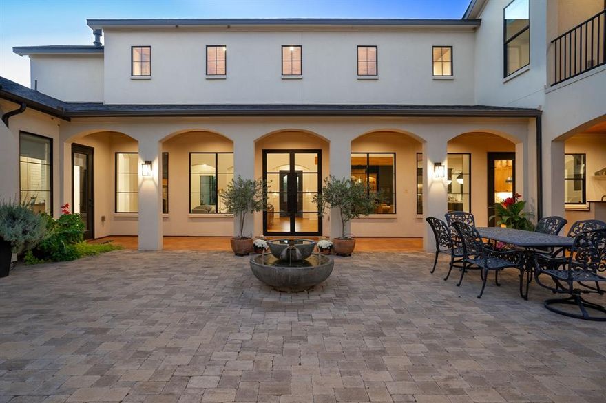 This spectacular design build by Noble Classic homes checks every box! This AG exempt 5 acre property is absolutely stunning, the 4 acre pasture is home to native pecan & fruit trees that stand over 50ft tall. Additionally,  lot includes a stocked pond and gated entrance. The full service bar inside, offers a wine refrigerator, humidor, and ice maker. The open floor plan is the perfect luxurious entertainment area, Thermador appliances in the kitchen pair perfectly with the abundance of storage the cabinets hold. The amusement doesn't stop at the bar, the outdoor living area&courtyard includes a kitchen, bar and fireplace. The master bedroom has sleek hardwood floors, a fireplace, & access to backyard. Master bathroom presents double vanities, soak-in tub & walk-in shower with oversized walk-in closet. Upstairs office has exceptional amounts of natural light with direct access to the upstairs outdoor living area. SELLER WILL PROVIDE FOR INTEREST BUY DOWN W ACCEPTABLE OFFER!!