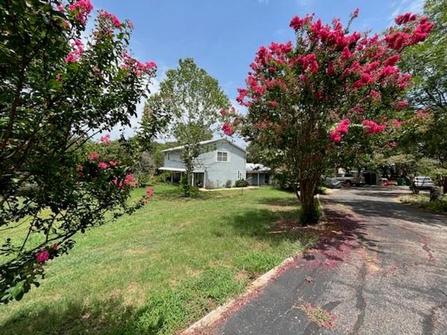 This 9.5 acre tract fronting on FM 2931, is located in the Aubrey ETJ.  Six acres is AG exempt. 
Two homes on property. Larger home is estimated to be over 2,400 sf in size, with three full bathrooms. Buyer to verify size. 
Nice shop, concrete floors, with two roll up doors 12x12, drive through. Measurements with 60 x 40 or 2,400 SF.  Has a large side shed for livestock stalls. 
Aviary on property was used for commercial quail production, recently housing poultry. Flight area is 120 x 15.
Beautiful mature oak trees, with beautiful crepe myrtles lining the driveway.