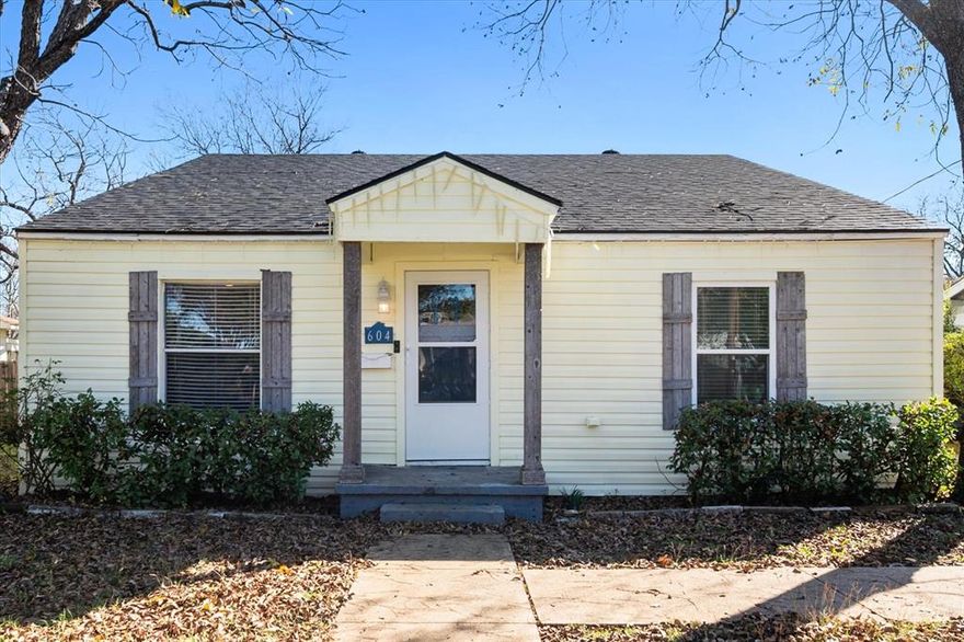 Charming and move-in ready 3 bed, 2 bath cottage, close to fine dining and shopping in historical DT Waxahachie! Spacious kitchen boasts painted cabinets, refinished wood island,and SS appliances. Open living is perfect for entertaining, w abundance of natural light from 2 sets of glass panel french doors. Sliding barn door opens to over-sized laundry w sink and built-in cabinets for ample storage. Enjoy large backyard with deck, newer fencing, and huge storage shed!