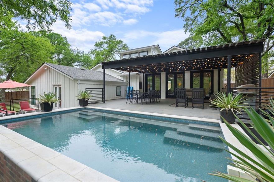 Lakeside Luxury in Grapevine! This stunning ranch style home is nestled on an expansive .59 of an acre lot near the shores of Grapevine Lake. This exquisite one-story ranch home has been completely reimagined from the ground up—offering the perfect blend of modern luxury and timeless charm. Featuring 5 bedrooms, 4 full baths, and an open-concept design, this home is a dream for those who love to entertain. Every inch of this residence has been meticulously renovated, including new electrical, plumbing, HVAC, insulation, and roofing, making it feel like brand-new construction. Sun-drenched interiors showcase high-end finishes, elegant flooring, and skylights that flood the space with natural light. The gourmet kitchen seamlessly connects to spacious living and dining areas, creating an inviting ambiance for gatherings of all sizes. Step outside to your private backyard oasis, where a large covered patio overlooks a Claffey custom pool, complete with a sunbathing deck—perfect for soaking up the Texas sunshine. The oversized yard features a fire pit, offering a cozy retreat for cool evenings under the stars.This one-of-a-kind Grapevine retreat is move-in ready and just steps from the lake and scenic trails, and minutes from all the charm of historic Main Street Grapevine and The Gaylord Hotel. Don’t miss the opportunity to own this extraordinary home! Come see it for yourself this Saturday April 4th 1-3pm.