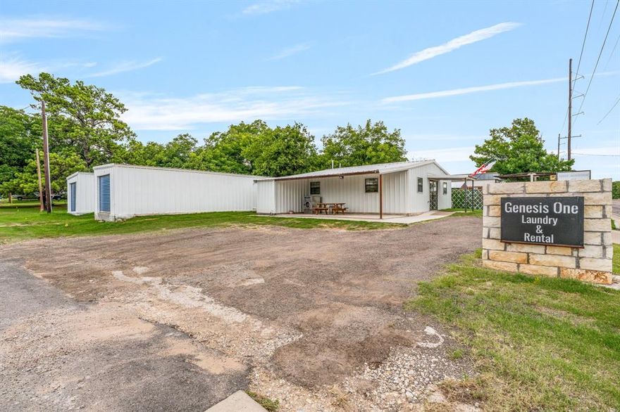 This property presents a unique opportunity to acquire a well-established, revenue-producing commercial property. With its
24-hour laundromat(13 washers,16 dryers), multiple (14) storage units, private well, and highway visibility, this corner-lot gem
is perfect for a buyer seeking stable cash flow and room for growth. Scalable opportunity- expand services such as wash and
fold, or add units. This property is very well maintained, clean and busy! Call for more information and a tour today.