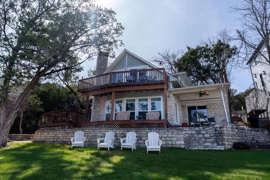 Step into this inviting home designed for comfort and relaxation, with views from most every room overlooking the main body of Lake Granbury. A sense of serenity flows throughout the space, creating a peaceful atmosphere from the moment you enter. Thoughtfully designed for everyday living, this property feels like your very own retreat. Minutes from historic downtown Granbury offering dining and entertainment options. This home shows its meticulous maintenance, new floors, lighting and paint. The pride of ownership is evident in every corner. If you are searching for a lake home for your family or considering a full- or part-time vacation rental, this property deserves a spot at the top of your list.  The boat and home furnishings are available for purchase together as a single package.