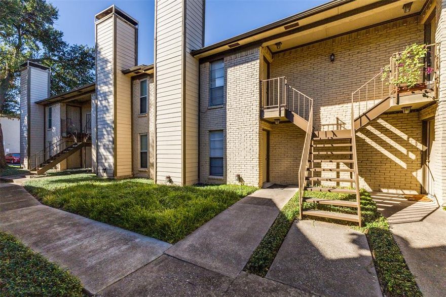 Updated one-bedroom, one-bath condo located on the first floor in the desirable One Steppington Place community in North Dallas. The spacious living area features wood-look flooring, a wood-burning fireplace, and a ceiling fan for year-round comfort. The recently remodeled  kitchen  features granite countertops, a stainless-steel stove and dishwasher, tile backsplash, refrigerator, and ample cabinet space. The bedroom includes two walk-in closets, providing generous storage, while the bathroom features updated finishes and modern fixtures. Additional highlights include full size in-unit laundry connections and central heating and air conditioning. Community amenities include a swimming pool with lounge area, well-maintained landscaping, assigned covered parking, and gated entry. The community is pet-friendly (per HOA guidelines), and water, sewer, and trash are included.   Conveniently located near Highway 75 , this condo provides easy access to NorthPark Center,  Preston Hollow Village, Preston Royal, Presbyterian Hospital and Medical City Dallas. A great opportunity for those seeking a low-maintenance lifestyle in a prime Dallas location.