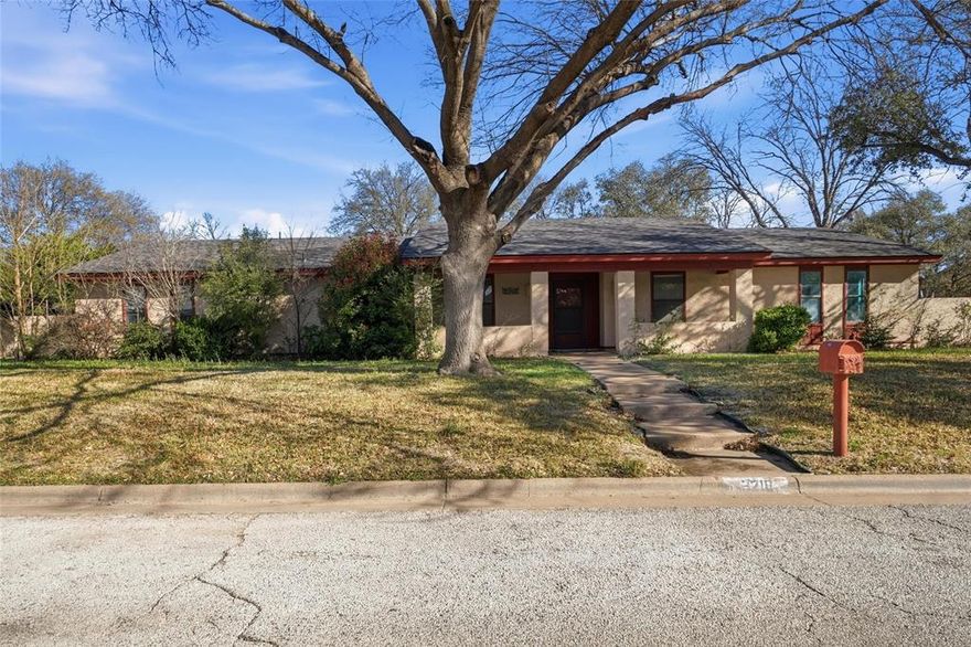 Corner lot home in established South Abilene neighborhood with mature trees. Tons of potential. Rear entry garage with long driveway. 4 spacious bedrooms and 3 full bathrooms. Large primary bedroom with walk-in closets, dual sinks, large walk-in tile show with glass door. Saltillo tile in all common areas. Great kitchen with chef's gas cooktop, double ovens with convection and microwave. War Beautiful Samsung refrigerator. Ample cabinets for storage and a breakfast bar. Private 4th bedroom with en-suite bathroom. Large, shaded backyard, sprinkler system and wood privacy fence.