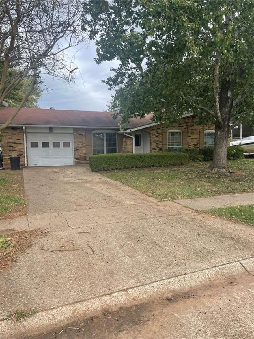 New flooring through out. All walls have been painted.  The ceiling in the den has been painted. Home has had a termite treatment Oct. 2025.  Make an offer!