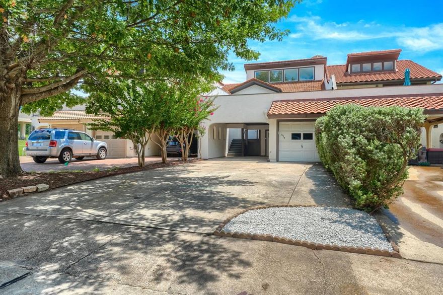 Fully updated and move in ready! Enjoy this beautiful lakefront community, Lakeside Village off of Lake Ray Hubbard. This 3 bedroom, 2 bath split level townhouse has plenty of natural light with vaulted ceilings, a wood burning fireplace, and a large new Trex patio deck for outdoor entertaining. All new windows, Large living area features LVT flooring, a fireplace and wet bar. Primary bedroom on the main level with 2 other bedrooms on the lower level. Bedroom on the lower level have an additional room offering space for an office, a bonus room or even an exercise room. Property backs up to the golf course area and is next to the tennis-pickleball courts, and near the playground. Lakeside Village offers a 9 hole golf course, community pool, playground, basketball, tennis and pickleball courts. Marina is next door to Lakeside Village where you can store your boat and enjoy lake life in the summer months. Located in Rockwall ISD. Nearby shopping, and The Harbor restaurants. Downtown Rockwall is 10 minutes away and Downtown Dallas is about 30 minutes away.