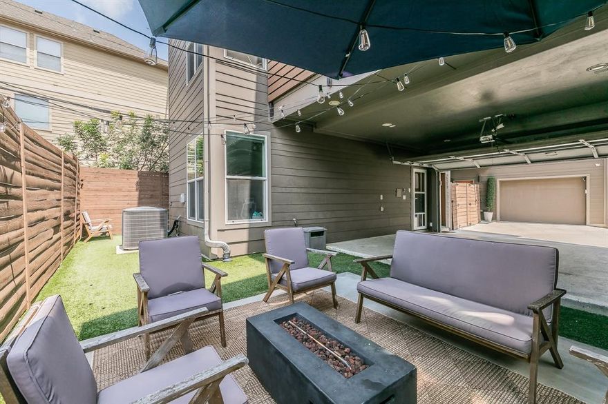 Located in the heart of the highly desirable Knox-Henderson-Upper Eastside area, this modern 2080 sqft corner-unit townhome is located in a gated community and offers an exceptional blend of style, space and walkability. The 3 story residence features fresh paint, remote control shades, hardwood flooring throughout and a rare over-sized wrap-around yard with low-maintenance artificial turf - perfect for pets & outdoor entertaining. The first floor welcomes you with a foyer and a spacious guest suite complete with an ensuite bath and walk-in closet (currently being utilized as a stay-at-home office). The second level has an open-concept floor plan and seamlessly connects the kitchen, dining and living areas, along with access to a private balcony. The third floor is home to the laundry, primary suite and a secondary bedroom, each featuring ensuite bathrooms. The primary retreat includes a walk-in closet and a spa-inspired bath with dual sinks and a walk-in shower.  Set within a private, gated community, the home provides both privacy and security. Enjoy an unbeatable location just steps away from upscale dining, local bars and boutique shopping as well as near the long-awaited Henderson Avenue Mixed Use Development expected to be completed by Fall 2026!!