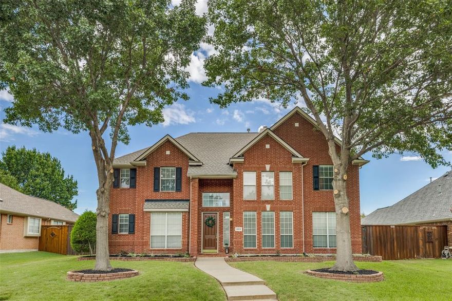 Stunning 5-bedroom, 4-bath home with over 4,200 sq ft in the sought-after Southpointe Estates community of Richardson. This spacious and well-maintained residence features a bright, open floor plan with soaring ceilings, a wall of windows, and beautiful hardwood floors. The chef’s kitchen includes granite countertops, a center island, gas cooktop, stainless steel appliances, and abundant cabinet space. The first-floor primary suite offers a peaceful retreat with a large ensuite bath, dual vanities, soaking tub, separate shower, and walk-in closet. A private guest suite is also located on the main floor. Upstairs, enjoy a large game room, media room, three additional bedrooms, two full baths, and a balcony overlooking the backyard. The oversized backyard is ideal for entertaining with a covered patio, 8-ft board-on-board privacy fence, and electric gate. Three-car garage with alley access. Zoned to top-rated Plano ISD schools and located just steps from Breckinridge Park and minutes to major highways, shopping, and dining.
