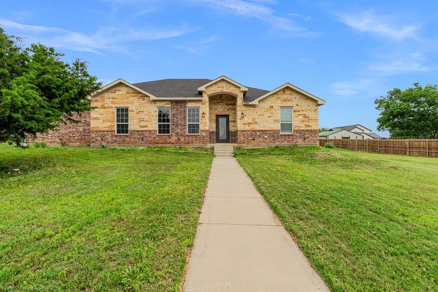 **Motivated Sellers, Bring all offers!** 
Welcome to this beautiful corner-lot home located on a half acre lot in the Pyramid Acres community! If you’re looking for a multi-generational home with a bonus space in a peaceful and friendly neighborhood, then look no further! This non-HOA community is just outside of city limits and has no city taxes. This home provides five spacious bedrooms - a large flex room - three full bathrooms - and a two car garage.

This property boasts a mixture of stone and brick exterior along with a complete irrigation sprinkler system, aerobic septic drip system, well water pump house with whole home water-filtration system. Interior finishes include 9 to 12 ft. ceilings, granite countertops, stainless steel appliances, and LED lighting fixtures throughout. Conveniently located within 30 minutes of Granbury, Fort Worth, Aledo, and Benbrook. 

This property is wired for high-speed fiber internet (provided by AT&T), which is not the case for the entire community. It includes an In-Duct Whole Home Air Purification system that actively reduces bacteria, viruses, odors, mold, allergens and dust ensuring excellent air quality. Hot water heater includes a powered anode rod for better corrosion protection.

No City Water - No City Sewage - No City Taxes - No HOA!