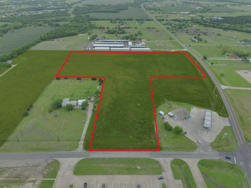 Currently agricultural land with strong potential for commercial rezoning. Frontage on a well-maintained road with easy access to major highways. The land is flat and well-drained, ideal for building.   The property has a current land lease for farming.  Deed restrictions against convenience store or gas station.