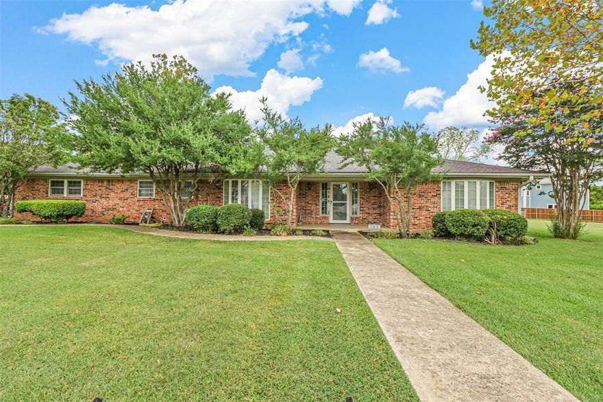 BUY TOGETHER with MLS#20660729! Traditional house on half an acre; additional .285 ac lot for sale! From the moment you enter this beautifully manicured walkway, you will fall in love with this 3 bd, 2 bth, 2-car garage home! The design of this home is spacious yet inviting; QUIET, steps away from Lake Texoma, Eisenhower State Park & borders Oklahoma. The vaulted ceilings in the family room are equipped with a beautiful brick-walled wood-burning fireplace, flanked by two exquisitely built bookshelves. This room is ideal for entertaining, as you overlook the magnificent backyard & covered patio. Take advantage of the garden & firepit out back. The HVAC was replaced in the summer of 2023. Never run out of hot water, as there are 2 water heaters on site, in addition to a septic tank.  This home has an abundance of storage options, built-ins & durable finishes that enable you to create endless design options. Enjoy the tranquility of this home, its surroundings & all of its possibilities!