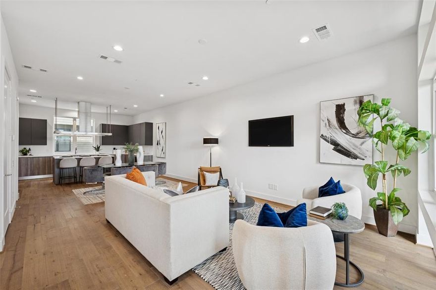 Built by Urban Lofts Townhomes, this modern home at 3064 Chimes Street offers 2,871 square feet of thoughtfully designed living with 4 bedrooms,
4.5 bathrooms, a private 2 car garage, and a fenced front yard in one of Dallas’s most ideal locations. Hardwood floors and abundant natural light
complement a very open floor plan that flows seamlessly across multiple levels, ideal for entertaining and everyday living. The layout includes two
spacious living areas and is pre designed to accommodate a future elevator if desired, providing long term flexibility. The kitchen anchors the main
living level with stainless steel appliances, a gas cooktop island, built in wine refrigerator, and custom cabinetry. Bedrooms are generously sized with
abundant walk in closet space throughout. Outdoor living stands out with a second floor covered patio and a fourth floor rooftop terrace offering
expansive views of the downtown skyline, creating an ideal setting for relaxing or entertaining. This townhome offers exceptional space, flexibility,
and downtown views in one of Dallas’s most ideal locations.