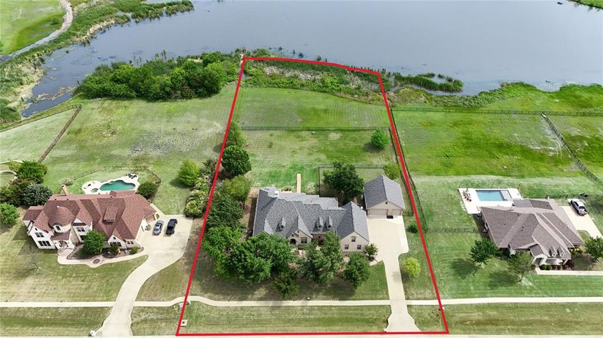 Welcome to this stunning one-owner custom home, thoughtfully designed with both luxury and functionality in mind. Featuring 4 spacious bedrooms and 4.5 bathrooms, this home offers an ideal layout for comfortable living and effortless entertaining. Situated on a premium lot backing up to a serene pond, you’ll enjoy peaceful water views and added privacy right from your backyard. Inside, the custom craftsmanship is evident throughout, with plenty of storage, generous living spaces, and attention to detail at every turn. Car enthusiasts, hobbyists, or those needing extra storage will appreciate the rare combination of a 3-car attached garage plus an additional climate-controlled 3-car detached garage—complete with a car lift that will convey with the property—offering endless possibilities for vehicles, a workshop, or recreational space. Lovingly maintained by its original owner, this home reflects pride of ownership and is truly move-in ready. A unique opportunity to own a custom-built property in a beautiful setting—don’t miss it.