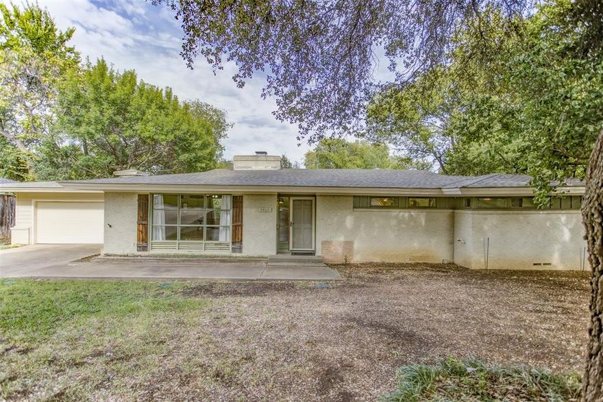 Find this gem in the desirable Ridglea Hills, sitting on a .438 acre lot. This one-story brick in traditional family style, bears all the charm and character known to this area. The tiered backyard will definitely temp your imagination to transform this lush palette of multitudes of green foliage into a lovely retreat to enjoy the outdoors.