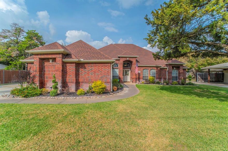 Take a look at this beautiful custom built, one owner, totally move in ready home on a huge well cared for and landscaped property, you will be very glad you did. There is lots of space for everyone in this home. Whether you enjoy the open floorplan in the family room or the patio and pool are more your style you will find a space you love. This 4 bedroom, 3 bathroom home has many custom feature throughout that will make your families life much happier and easier. All off the rooms have plenty of natural light in addition to the recessed lighting in many of them. Start your day in this wonderful kitchen and breakfast area with everything stored away but handy to get to in the many custom cabinets and pantry spaces.  Your personal space is the Primary wing of the home with lots of room and with extra sound barrier in the walls you will get the quiet you want. The large well equipped en suite bath and walk in closet finish off what will be one of the favorite parts of home for you. The other three bedrooms are all good sized and have large closets. Coming home you pull into the driveway and enter through the side garage to take your packages and groceries straight into the utility part of the home. While you were pulling into the driveway did you notice the 30ft x 40ft metal building for you to do anything you want with. Man cave or she shed, no way, this is a MANsion or She Shop. Lots of parking for your vehicles and toys behind the gate. Now to get to a highlight of this property. The pool and patio are without a doubt the place where family and friends will feel welcome and loved on those beautiful Texas days and nights that they are invited to join your daily fun. In addition to all of this not only does this home sit in the heart of DFW with everything you want to do within minutes this street is one of the most desired in Grand Prairie. Homes rarely come up for sale on this block and go fast when they do! Let your agent know you want to see it today!