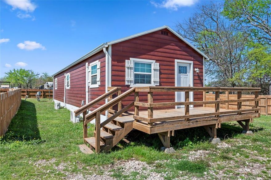 Beautiful 2 bed, 2 bath home in Holiday Village of Lake Fork. This property offers access to all Holiday Village amenities, including a private boat ramp, clubhouse, community pool, and additional neighborhood features. Convenient floor plan with comfortable living spaces, ideal for full-time residence, weekend getaway, or investment opportunity. Enjoy the benefits of lake community living while remaining close to downtown Quitman and local conveniences.