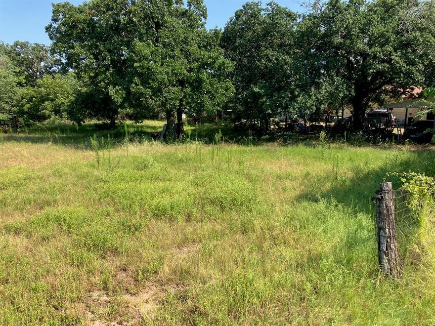 Unrestricted .52 acre City Lot measuring 150' x 150'.  All city utilities available - has some nice large Oak trees.  Great location for a new home!