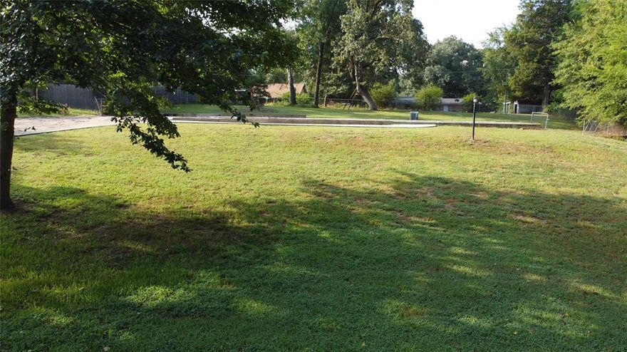 Here is a beautiful lot in the most desirable neighborhoods in Quitman, Texas. The home at this location was lost due to a fire. The remains of the home were demolished and hauled away. The slab and driveway are still there and could possibly be used in a rebuild. This lot would be the perfect building spot for a custom home. The pad for the home is elevated with great drainage, beautiful trees and wonderful yard. The lot is located just minutes away from downtown Quitman. Quitman is the county seat for all of wood county. Quitman provides excellent schools, great shopping, good churches and is the perfect community to call home. There are not any other lots available in this neighborhood so come and take a look at this amazing building spot.