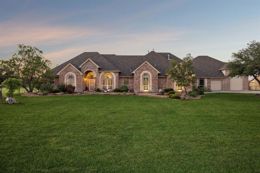 Experience resort-style living in prestigious Cattlebaron Parc, a private gated equestrian community offering an extraordinary multi-generational estate on 2.67 acres. Designed for both connection and independence, this rare property features two exceptional homes under one roof, ideal for extended family, adult children, guests, or in-laws — all thoughtfully designed on a single level. The primary residence offers 3,462 square feet with 4 bedrooms, 3.1 baths, and three spacious living areas. A chef’s kitchen anchors the home with stainless steel KitchenAid appliances, large island, walk-in butler’s pantry, and open flow to the family room for effortless entertaining. The attached second residence spans 2,084 square feet and is ADA compliant, featuring 4 bedrooms and 2 full baths. Separate fencing allows the second home to be privately isolated from the pool and entertaining areas when desired. Step outside to your private backyard resort featuring nearly 2,000 square feet of covered patio space complete with a fully equipped outdoor kitchen offering abundant counter space, Built in Grill, outdoor burners, teppanyaki grill, refrigerator, sink, custom Govee permament lighting, and soft-close cabinetry. Enjoy the sparkling pool, separate oversized hot tub beneath the covered deck, putting green, outdoor pool bath, and remote-controlled patio screens providing shade and comfort year-round. Car enthusiasts and hobbyists will appreciate the impressive 9-car garage configuration featuring Guardian garage flooring, including a separate 2-car garage plus an expansive 7-car showroom with workshop and RV bay. Additional highlights include a 26kW whole-property generator servicing both homes, pool, and well; water softener system for both residences; and a 2025 HVAC replacement featuring an air purification system. A truly rare opportunity combining luxury, flexibility, and resort-style amenities in one exceptional estate.