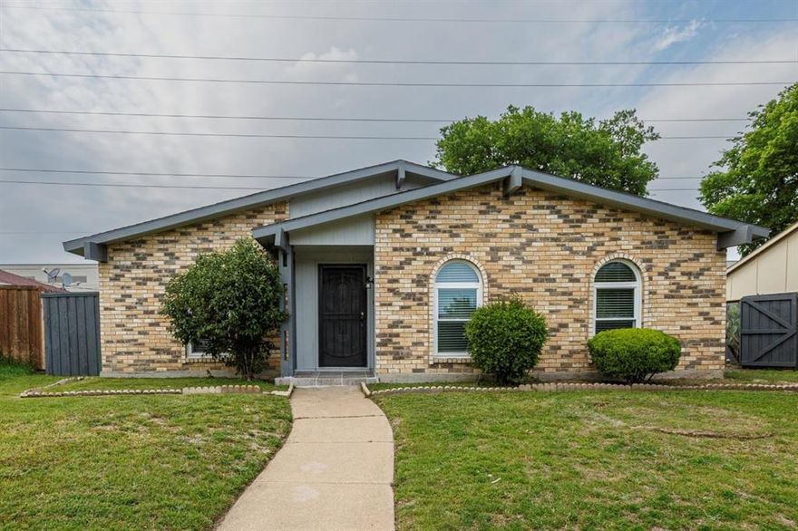 When a home is meticulously loaded with upgrades you will experience a beautifully reimagined home that is renovated from top to bottom with the outstanding quality of upgrades in products and labor that baths the home all over.  It is a MUST have 3-bed, 2-bath 2- living area home that offers an open-concept layout for the family and a private formal living room and formal dining room space for visiting guess. The spacious family room has a striking accented brick wood-burning fireplace at the core of activity that shares the beauty with a seperate breakfast area that has a breakfast counter bar for casual dining with the family or friends. This kitchen is styled with an electric stove, and cooktop with overhead stainless exhaust system, pantry, and a built-in refrigerator space.  This home consists of a ton of natural light which highlights the light wood-like beautiful toned floor thru out the home which helps maintain a cozy indoor atomsphere.  The primary bathroom and hallway bathroom stepped right off the page modern home fashion. The large rear wood fenced yard also has large patio slabs for outside cooking or entertaining. The 2-Car rear entry garage was included in the exciting upgrade renovation with a new gagage door and new painting to accent the new epoxy garage floor., This home gives one easy access to shopping centers, employment centers, improved freeway access, and entertainemnt at the White Rock Lake or Lake Ray Hubbard. It is move-in ready, oh taste and see that it is good. HURRY don't miss this one.