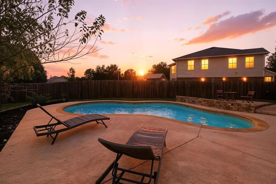 Seize a life-changing opportunity to assume a 3.15% VA loan—a rate that could save you thousands versus the current rates! This is the ultimate lifestyle hub, perfectly positioned for the modern commuter, the work-from-home professional, or the family that values both connection and personal space. A large yard AND a pool are unheard of at this price!!!  Step inside this move-in ready, open-concept home.  The main floor is unified by elegant wood-grain luxury vinyl plank floors with a huge living room, anchored by a cozy wood-burning fireplace, flowing seamlessly into a gourmet kitchen designed for gatherings, & featuring both a dining space and eat-in bar area.  A convenient half-bath, oversized laundry room, & the ultimate 5th bedroom flex space, perfect for your dream home office, a private gym, or a dedicated playroom. The versatility continues upstairs with a second, spacious living area and three generous guest bedrooms (two with large walk-in closets) & also a full guest bath. The true showstopper is the massive primary suite, an exclusive sanctuary featuring a dedicated sitting area, two separate closets, and a large ensuite with split vanities, a deep soaking tub, and a separate shower. AND DON'T FORGET, the private oasis awaiting outside with a sparkling play pool & beautiful stone courtyard. The backyard has a separately fenced grass area, complete with its own patio, providing a perfect, secure space for kids and pets. The Bliss in the address is no accident; this home is engineered for an effortless lifestyle. Your commute is a breeze with rapid access to I-35W & 820, & you are just minutes from the vibrant Alliance Town Center, placing HEB, Kroger, theater, dining, and medical offices right at your fingertips.