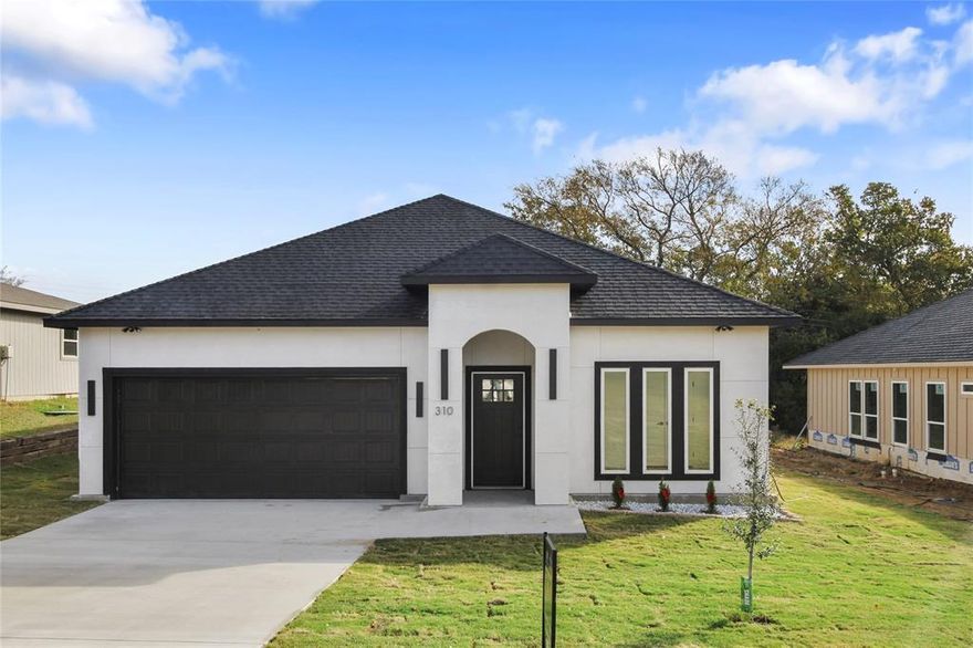 Discover modern living in this beautifully crafted new-build home featuring 3 spacious bedrooms, 2 full bathrooms, and an additional flex room—perfect for a home office, playroom, or nursery.

Designed in a clean modern-transitional style, this home offers high 9 ft ceilings, thoughtfully placed windows for abundant natural light, and premium finishes throughout. A 2-car garage with an EV charger adds everyday convenience and future-ready functionality.

Enjoy the outdoors with a covered patio, nice-sized backyard, and brand-new grass, perfect for relaxing or entertaining. Plus, you're within walking distance to the lake, providing peaceful scenery and a refreshing escape just steps from your door.

Whether you're looking for a primary residence, a smart investment property, or a weekend getaway from the city, this home checks every box. Become part of a town experiencing quick development, offering charm, opportunity, and a welcoming community.

And for qualified buyers, ask us how you can get approved for a $0 down payment—excellent financing options may be available!
With brand-new everything, this home delivers comfort, style, and endless possibilities.