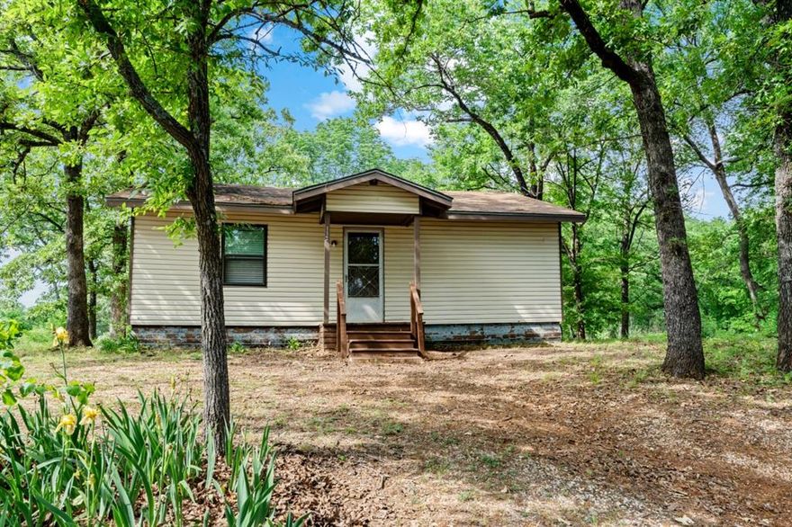 Move in ready or light fixer upper, this cute home is located in the Oak Acres subdivision of Cedar Creek Lake. The property is a very short walk from the wide open water and offers a serene and relaxing surrounding. Sitting on a large corner lot, the house has 3 bedrooms and 2 full bathrooms and lots of living space. The kitchen and living room are an open concept design with a large utility room-bathroom. If you are a weekender or full time, Oak Acres gives you an HOA community that features a boat launch and a very peaceful living environment. Whether you enjoy boating, fishing, walking or just taking it easy, this is the place to be!