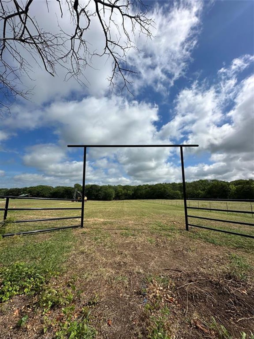 Embrace the beauty of Texas country living on this serene 2-acre homesite in Whitewright. Tucked among beautiful custom homes and just minutes from Hwy 121, this property offers the ideal blend of peaceful seclusion and everyday convenience. A quiet creek runs along the back, adding natural charm and a perfect backdrop for your dream home. At the entrance, a bold black pipe fence makes a welcoming first impression. A water meter is already installed, fiber internet available and electric is available at the road—saving you time and money as you build. The land is mostly open, with mature trees along the back, offering endless possibilities for a farmhouse, barndominium, or custom build. Located in a rural setting with a small-town feel, you’ll enjoy the slower pace of country life while still having easy access to shopping, dining, and commuting routes. Reasonable property taxes and no HOA make this an even more attractive investment. Don’t miss this opportunity to own your own piece of Texas countryside—ready for your vision and future.