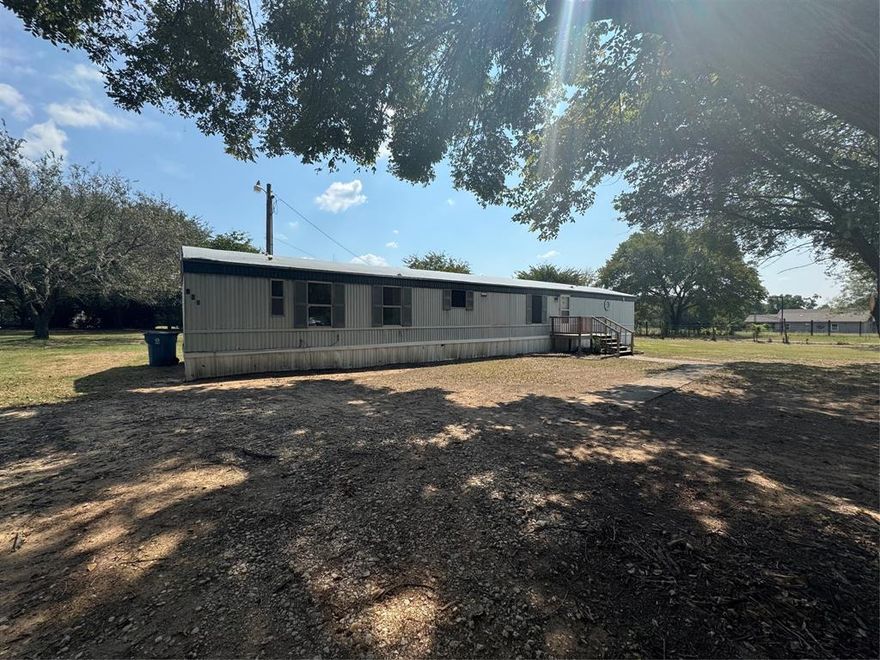 Nice double wide on land in a cul-de-sac!  Open concept, splt bedroom floor plan vinyl looks like wood in living and dining area, master features oversized room with a garden tub in master.  Propert is right off of 67 between Cleburne and Alvarado.