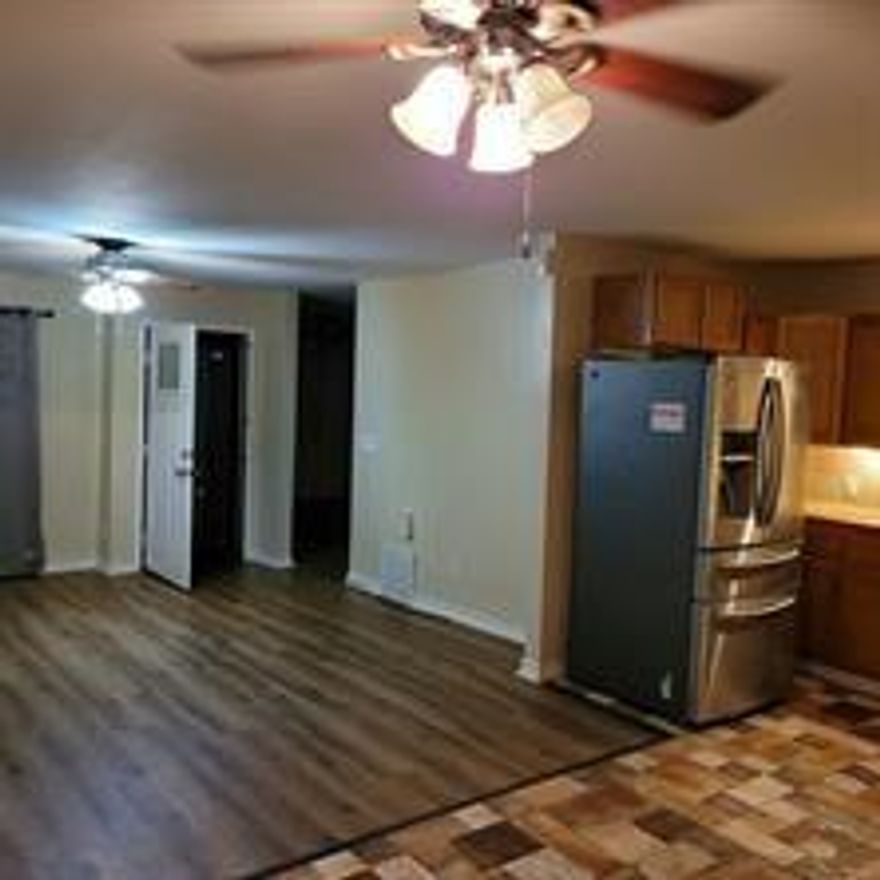 Welcome to this charming one-story home with 3 bedrooms, offering a perfect blend of comfort and convenience.  Step inside to discover a spacious and inviting living space, designed for modern living.  the open kitchen allows for seamless entertaining, making it the heart of the home.  Enjoy the privacy and security of a fenced backyard, providing a safe space for kids and pets to play.  With easy access to local shops and restaurants, you'll never be far from the amenities you need. Whether you're looking for a cozy family home or a peaceful retreat, this property checks all the boxes.  Motivated Seller!  Includes refrigerator, washer and dryer.