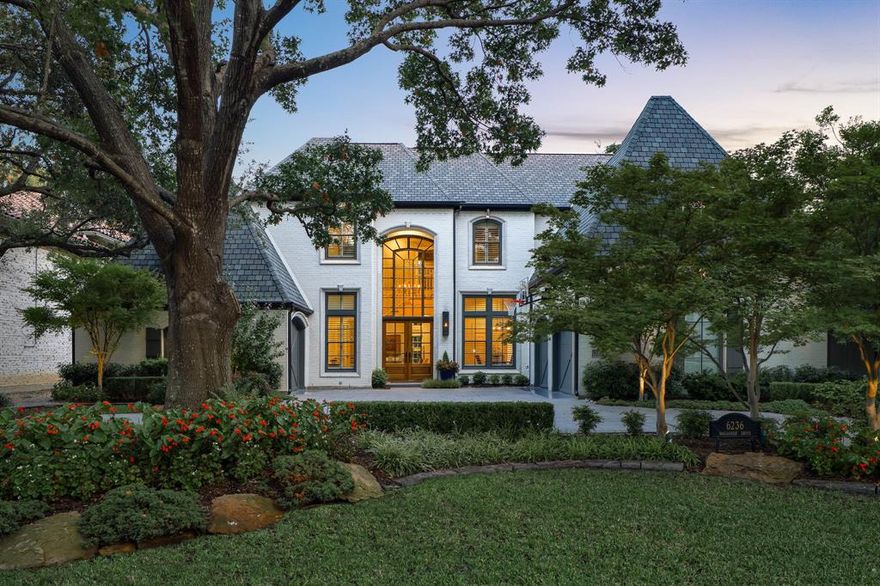 Welcome to a beautifully updated home in the heart of the Fairway of Preston Hollow — where timeless architecture meets relaxed modern luxury. Thoughtfully renovated between 2020 and 2025, this 5,228-square-foot residence per appraiser is filled with natural light, soaring ceilings, and rich custom millwork. The layout is both elegant and inviting, with five spacious bedrooms, four full baths, two powder rooms, and a flowing design that makes entertaining effortless. The first floor features a sophisticated study, formal dining room, and multiple living areas — including a warm and welcoming family room with a fireplace, built-in wet bar, and easy access to the outdoor terrace. At the heart of the home is a stunning, fully updated kitchen outfitted with top-of-the-line appliances, quartzite countertops, a gas cooktop, double convection ovens, and a generous prep island. A spacious breakfast area connects seamlessly to the main living spaces, creating the perfect gathering spot for casual meals or morning coffee. The first-floor primary suite offers the perfect retreat with dual walk-in closets, a spa-style bathroom featuring separate vanities, a dressing counter, a jetted tub, and a well-designed layout that feels both functional and indulgent. Step outside to enjoy a pergola-covered entertaining terrace complete with a built-in fire pit and a beautifully turfed lawn, surrounded by lush, mature landscaping that provides privacy and year-round beauty. Additional highlights include garage parking for three cars,  huge storage, and timeless architectural details throughout. Every corner of this home reflects a thoughtful balance of comfort, style, and sophistication. Perfectly situated in the Fairway of Preston Hollow, this residence offers quick access to top-rated schools, premier shopping, dining, and everything Dallas has to offer.