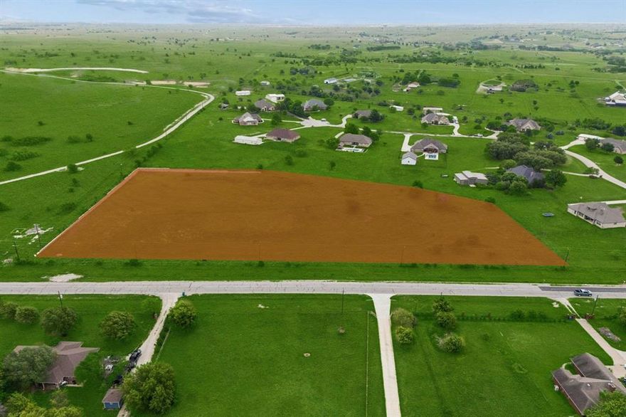 Welcome to an extraordinary opportunity to own a sprawling 5.735-acre homesite, perfectly positioned in the highly acclaimed Aledo ISD. This prime location provides easy access for city commuters while still delivering the peaceful, upscale lifestyle you’ve been searching for. This expansive property invites you to bring your vision to life. Imagine designing and building a stunning custom estate tailored to your every desire, where luxury meets comfort and every detail reflects your personal style. Picture a grand residence complemented by a resort-style pool, expansive outdoor living and entertaining areas, a sports court, lush landscaping, and even a private guest house. With 5.735 acres, the possibilities are truly endless, giving you the freedom to create a one-of-a-kind retreat. For builders and developers, this property also presents a rare and exciting investment opportunity. With ample space and a highly desirable location, there is strong potential to subdivide and develop multiple homesites, maximizing both value and return. Surrounded by beautiful homes, this property offers the perfect foundation for something truly exceptional. Whether you’re dreaming of building a luxury estate or seeking your next development project, this remarkable lot is ready to be transformed into something extraordinary. Bring your imagination, your plans, and your vision, this is where it all begins.
