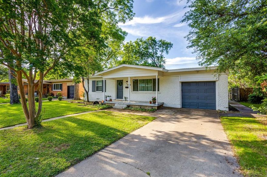 Step into this warm and welcoming home full of character. Built in 1955, enhanced with the original hardwood floors and a large picture window that looks out to the covered front porch, which is a gathering place for morning coffee or evening conversations. This neighborhood is known for its charm, well kept homes and mature trees. Inside, there is a spacious living room filled with natural light PLUS an additional family room or office space. In between those two living areas is a cozy kitchen with a newer gas range to create all those special meals. Out back there is an extended covered patio to enjoy. You can sit around the fire pit and make smores with family and friends. A back door to the garage connects to the patio for easy access to storage items or your vehichle. Some of the updates include double pane windows, a new roof in 2019, dishwasher in 2020, HVAC & gas range in 2023, gas water heater in 2024. Also included are a Nest thermostat, refrigerator, propane gas grill and there are no popcorn ceilings. This charming home is perfectly positioned in the heart of it all with easy access to major highways, AT&T Stadium, Globe Life Field, UTA and DFW Airport. You get the best of city living with a neighborhood feel. If you are searching for a great place to call home or looking for a savvy investment opportunity, this home is the ideal blend of comfort, convenience and vibrant city access.