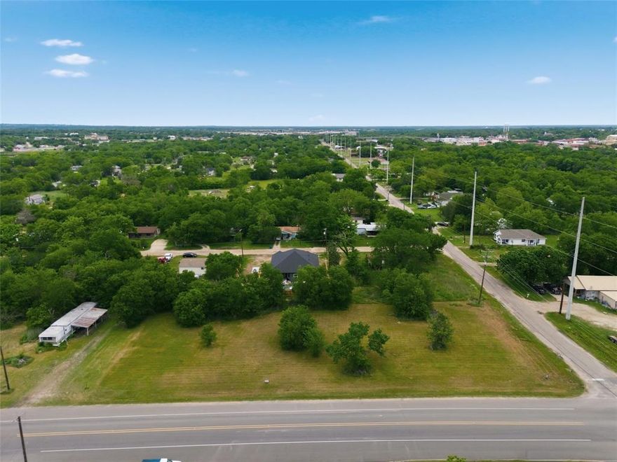 Enjoy your own corner of Mexia. An opportunity that won’t last long in this rural community known as a certified -Tourism Friendly Texas-, also known for its small town peaceful and relaxed feel. 5 lots on .66 acres a rare find conveniently located on the corner of a city road. Electricity, water, sewer, cable available for these lots, are at the road. With shade trees on a level lot, it is open and level. This lot is 115 ft deep and 250 ft along the frontage road Tyler St. Flexible property use allows for manufactured homes, tiny homes, cabins, garden homes, and RVs. Whether you are looking to build a peaceful country home, create a weekend retreat, or invest in land for the future, these tracts offer flexibility and convenience in a quiet rural setting. The small town community here has a very relaxed and peaceful feel that anyone can appreciate. Come take a look and see opportunity!