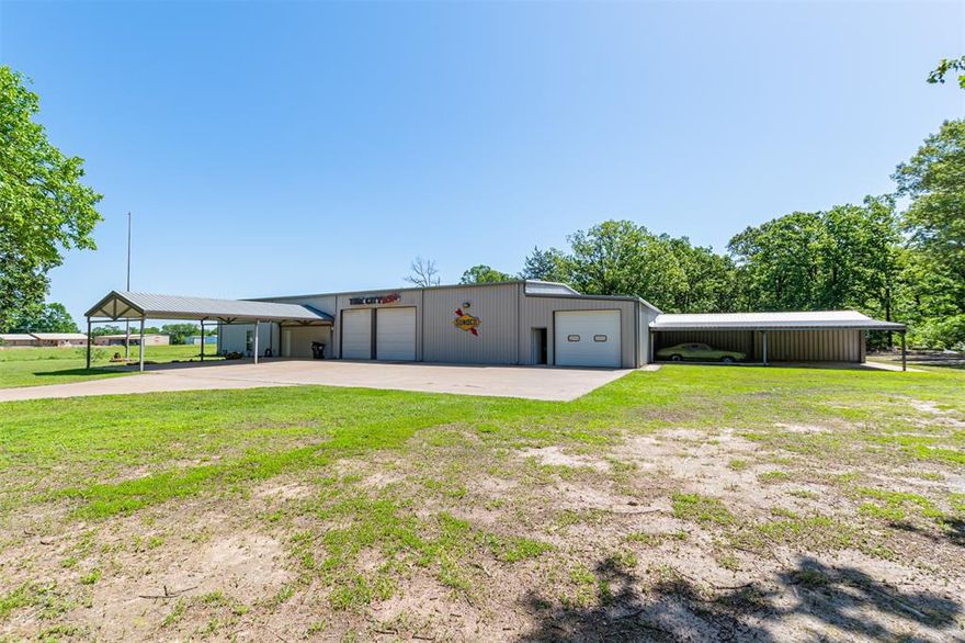 Ultimate Shop Property with Living Quarters on Nearly 10 Acres – Rains County, TX This one-of-a-kind property is a dream setup for anyone needing space, functionality, and room to enjoy the outdoors. Featuring an impressive 6,000+ sq ft shop paired with 2,000+ sq ft of living quarters, this property offers the perfect blend of work and lifestyle. The expansive shop is fully equipped with a car lift, upstairs storage, a bar area with half bath, and additional storage space—ideal for hobbies, business use, or entertaining. A shipping container provides even more storage flexibility, while three covered carport spaces add convenience. Situated on nearly 10 acres, the land offers a beautiful mix of large mature trees and open pasture, giving you both privacy and usability. Located in Rains County, just minutes from Lake Fork and Lake Tawakoni, this property combines peaceful country living with easy access to some of East Texas’ best fishing and recreation. If you’ve been looking for the ultimate shop setup—this is it.