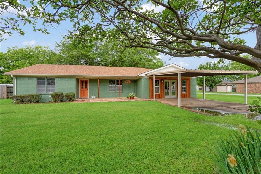 Freshly updated, this charming home—with a detached workshop—is thoughtfully renovated and ready for you to make it your own.  
Recent updates (within the last 3-4 months) include:
• Laminate floors in the kitchen, living room, bedroom #3, and hallway’s
• Luxury vinyl tile with grout in laundry, primary bathroom, and secondary bathroom
• Carpet in primary bedroom and bedroom #2
• Water heater (March 2025)
• Roof (April 2025)
• Interior doors
• Freshly painted kitchen cabinets, interior walls, and exterior of home 
• Shop skylights (clear corrugated roofing sheets)
• Front entry paver walkway
• Primary Shower 
• Exterior cedar accent wall located under the carport awning 
• Front porch cedar posts
• River rock in back patio
• Entry way porch lights
• Kitchen backsplash
• Primary bath lights, vanity, and mirror
This home offers a welcoming layout that is both inviting and versatile. The detached workshop—with its roll-up door, car hoist, and paved concrete driveway—provides space for projects, storage, extra parking, or even a small business setup. Conveniently located just down the street from the elementary, middle, and high school, and only a hop, skip, and jump away from Lake Texoma, this property blends comfort with a prime location. Whether you're seeking a move-in ready home or space to create and grow, this one checks all the boxes.