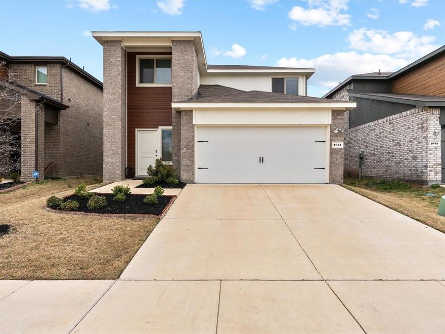 Step inside this gorgeous, barely lived in 2022 built home situated in the master planned community of Travis Ranch. A beautiful curb appeal with breathtaking two story entry welcomes you inside this spacious 4 bedroom, 2.5 bath home. This desirable floor plan was designed with entertaining in mind and features easy to maintain wood-look Luxury Vinyl Plank floors throughout the open concept kitchen, living and dining areas. Whip up a home-cooked meal in the fully equipped kitchen with Quartz counter-tops, stainless appliances, and island. The primary bedroom is peaceful tucked on the first floor and offers an en suite bath and large walk-in closet. The whole family will love spending time in the upstairs game room with plenty of opportunities to create memories. Enjoy hosting summer BBQ's in your private fenced backyard with a covered porch. Travis Ranch has amenities galore with a community pool, playground, and greenbelts. Great location just a short distance to Lake Ray Hubbard.