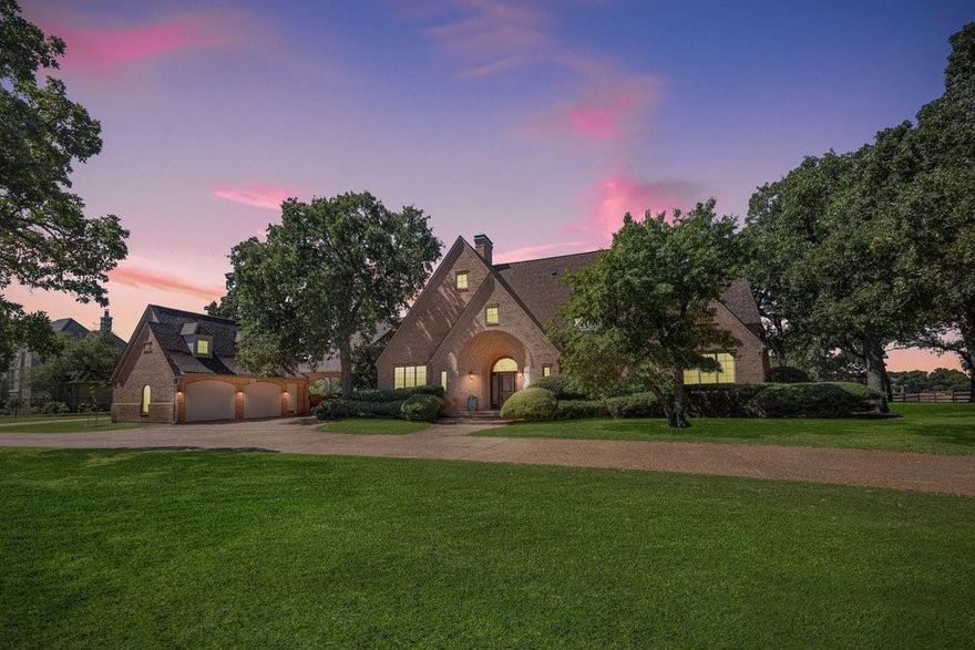 Discover a rare opportunity to own a piece of Texas history at this picturesque 15-acre horse property, formerly the site of the Flower Mound polo field. This estate offers breathtaking panoramic views & the charm of small town living, with a short commute to Dallas, DFW Airport & Fort Worth. Enjoy sunsets from the patio or relax by the stunning resort-style pool. The kitchen is a chef's dream! 1st Floor primary suite includes a study, generous closet & a spa-like bath. This home’s jewel is an inspired Great Room with cathedral beams.  A game room, dining room & 3 fireplaces, provide ample space & ambience for relaxation & entertainment. Equestrian enthusiasts will appreciate the 12-stall horse barn & two bedroom groom’s quarters (approx.1000 SF). Property has an ag exemption & active hay production. Excellent road frontage & prime location provide potential for development. 40 GPM well & 2024 roof on house & barn. Two gated entrances, spacious garage, Porte Cochere & Governor’s Drive.