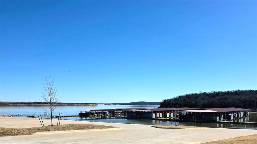 Reflection Bay is one of the last additions in Rock Creek to be developed and one of the closest to Lake Texoma.  Reflection Bay is currently a beautifully wooded area with all lots within a few minute walk to the lake, marina, Cross Timbers Hiking Trail and backs up to Lakeside Park making it easy to enjoy views and many other amenities without a drive. It is short drive by car or golfcart to the Nicklaus designed golf course, Rock Creek clubhouse restaurant, workout center, sports courts and pool area. In addition to lot 11, lot 10 is being sold by Seller's relatives so you can buy one lot or do the same and get friends or relatives buy the other to ensure you are side by side OR you can buy both and build one home on both lots for larger yard and more privacy.  Memberships to golf club vary and information on options should be obtained directly from Rock Creek Resort. Rock Creek Resort is 1300 acre, gated community on the shores of Lake Texoma and made up of both full-time and part-time residents.  You can see photos and video of the resort on their website.
