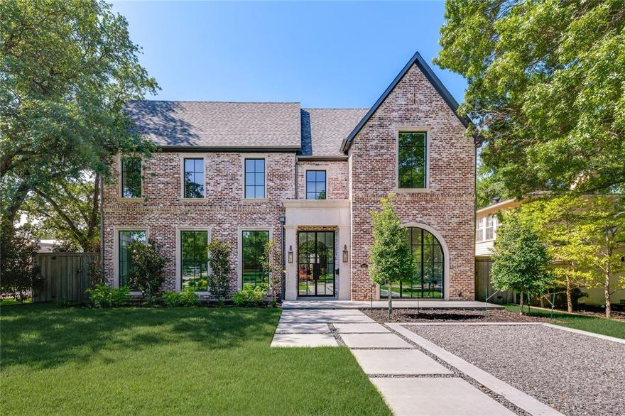 New construction residence by Langford Custom Homes located in the Fairway of University Park on a 70 x 160 corner lot. This property includes 5 bedrooms and 5.3 baths on 2 levels. The stately elevation features antique reclaimed brick from New Orleans, 10’ custom iron double doors and arched window, cast stone details and Lincoln windows. At the entry you are greeted by a 2-story grand staircase followed by two open living areas, dining room and powder bath. The kitchen includes a custom-made stainless and brass hood, 12’ white oak island, natural quartzite countertops and backsplash PLUS a full prep kitchen - both fully equipped with Wolf-Subzero appliances including secondary cooking, refrigeration, wine storage, sink and dishwasher. The large breakfast area and open living room feature an Isokern fireplace, four sets of 10 foot iron Cantera door systems opening to a large patio with fireplace, resort style heated pool with spa, fountains, turfed yard and lush landscaping. The floor plan includes a downstairs bedroom with ensuite bath, rare 3-car garage with secure access gate, an additional half bath, mud lockers and rear staircase. Upstairs features 4 ensuite bedrooms, laundry room and a large game room, walk-in storage area and an additional half bath. The Primary bathroom features natural marble, dual showers and white oak cabinetry. Additional finishes include solid white oak flooring throughout, coffered ceiling, elevator ready, Pennsylvania Blue slate entry, Bevolo gas lanterns, Brizo Delta and Phylrich plumbing, Serena & Lily and Visual Comfort lighting, custom cabinetry, Riad tile and marble and epoxy floor in garage. Excellent location within walking distance to HPISD Hyer Elementary and Caruth Park! Construction is complete and ready for occupancy. *Buyer and buyer's agent to verify all information herein*