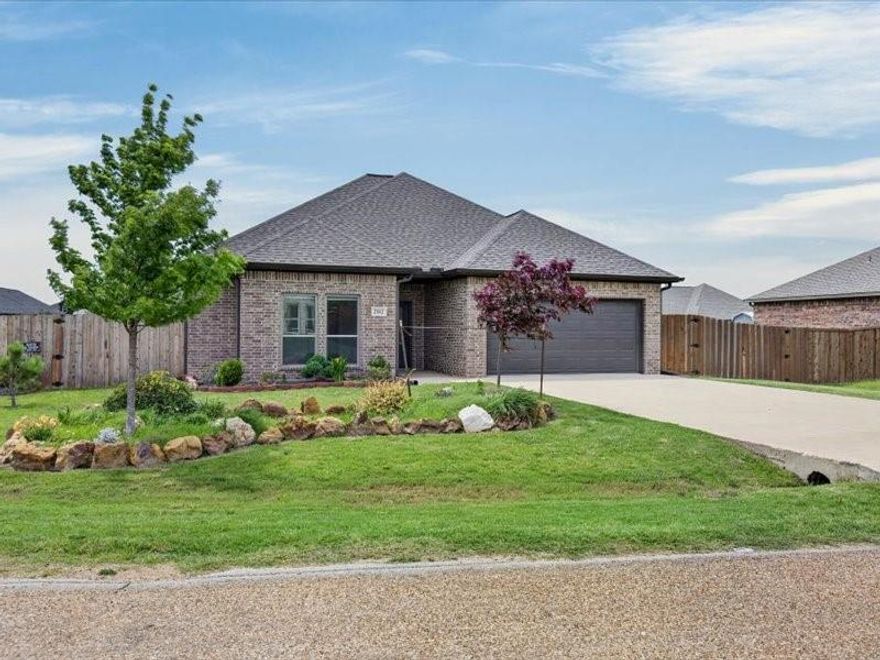 Welcome to this beautiful brick home built in 2021 in the Mabank Meadows community, just minutes from Cedar Creek Lake. This inviting 3-bedroom, 2-bath property offers a bright, open layout where the living, dining, and kitchen areas flow seamlessly together, creating a comfortable space for both everyday living and entertaining. The kitchen features a Bar height eat in counter, granite countertops, energy-efficient appliances, ample cabinet space, and an oversized pantry, making it perfect for cooking or gathering with guests. The living area is filled with natural light and provides a relaxing place to unwind. The split-bedroom design offers added privacy, with the primary suite tucked away and featuring an ensuite bathroom and an oversized walk-in closet. The secondary bedrooms are flexible for family, a home office or your guests. This home is complete with a large backyard offering plenty of space for your pets, gardening or just getting projects done in the work shed. There is a two-car garage that provides additional parking and storage. Conveniently located near schools, shopping, dining, and Cedar Creek Lake, this home combines comfort, functionality, and accessibility in a growing area.